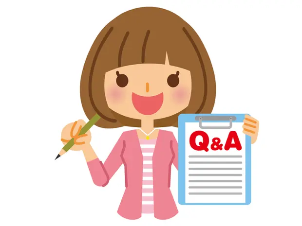 Q&Aの紙を持つ女の子