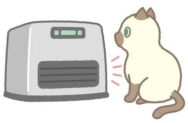 ストーブと猫