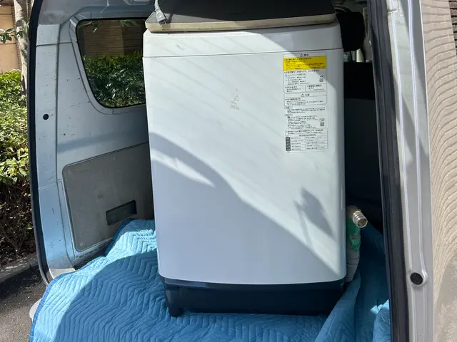 縦型洗濯機の移設、設置サービスの画像