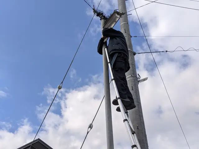 高所の電球交換。サービスの画像