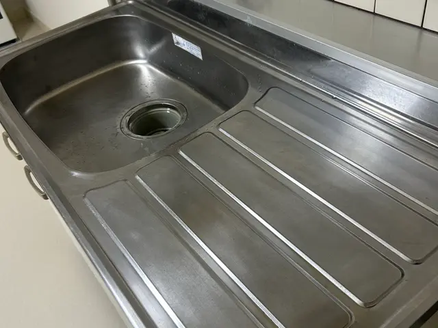 自社開発した環境に優しい洗剤を使いキッチンと換気扇を徹底洗浄致します。サービスの画像