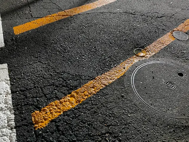 駐車場土間コンクリート塗装及びラインびきサービスの画像